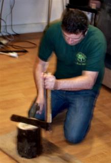 Paul splits the log for Chris